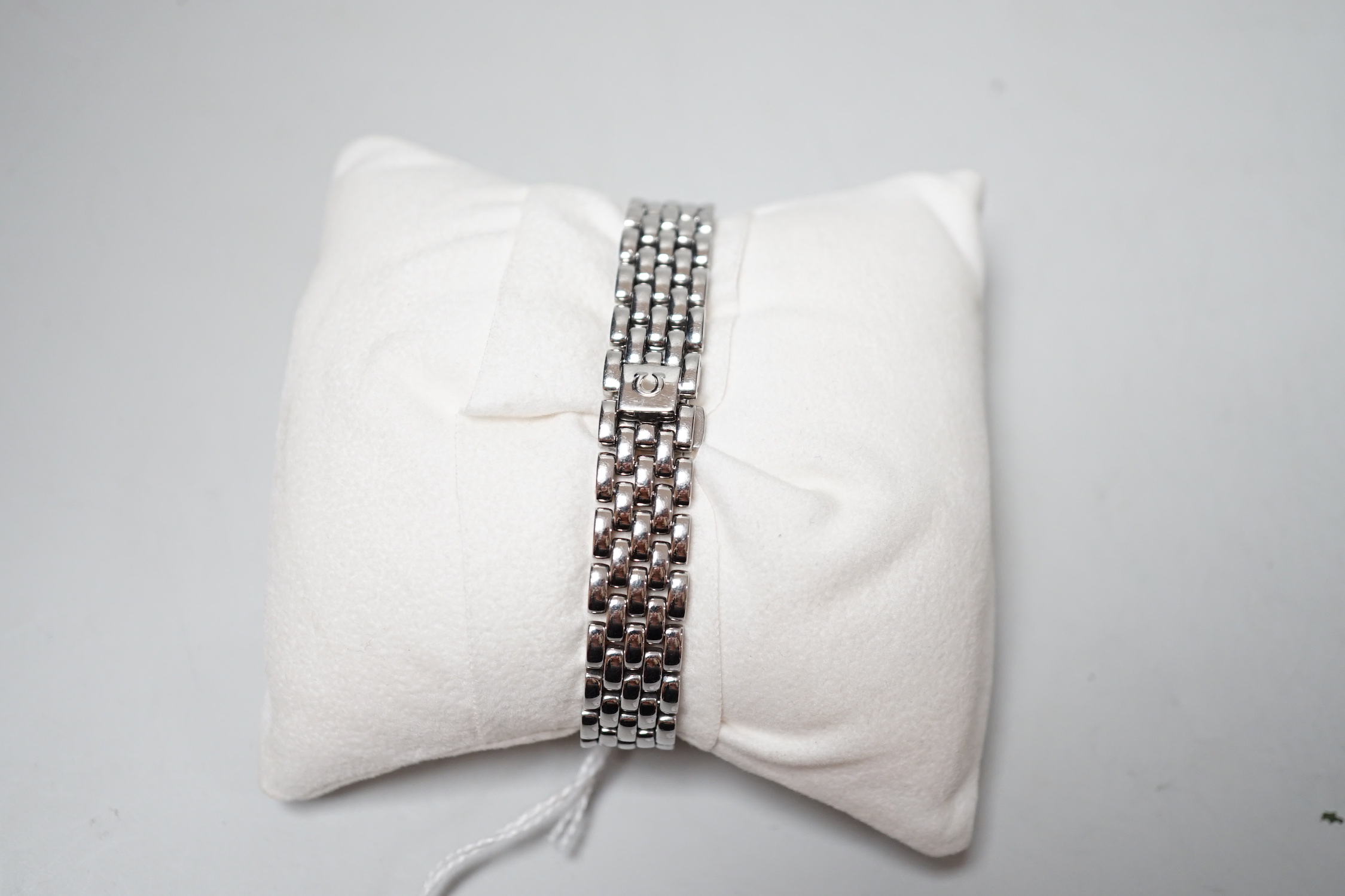A lady's 1990's stainless steel Omega De Ville quartz wrist watch, with blue dial, box and papers.